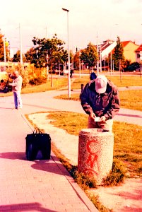 Praktica MTL 5 +  Helios 44-2 2/58 - Man in front of Scrap Basket