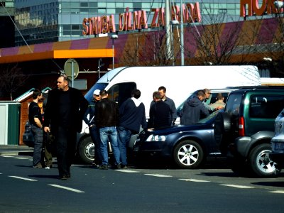 Group of Men in front of a Hobby Craft Store