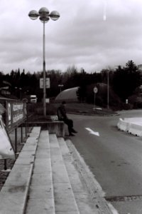 Kiev 4 + Helios 103 - Sitting man and an Arrow