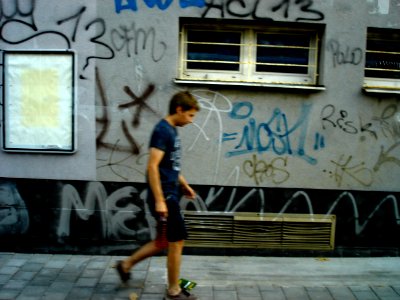 Lad Passing by Grafitties