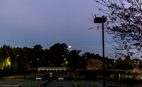 Full Moon Rising Over the Tennis Courts