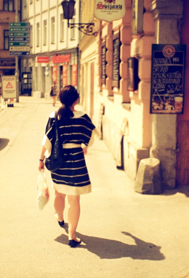Vilia-Auto - Redscale - Woman Looking at Pub Sign