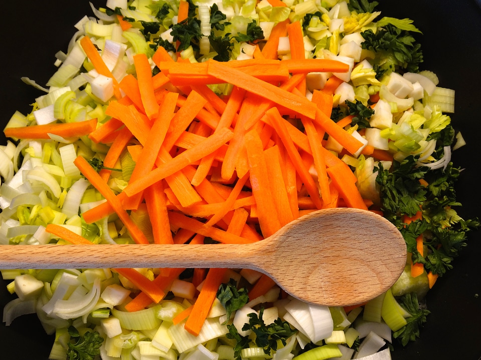 Vegetables cook wooden spoon
