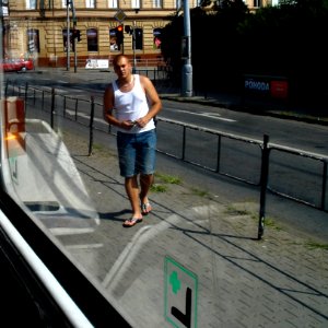 Man inside Tram Reflection photo
