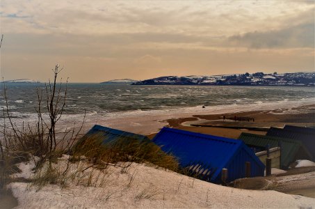 Abersoch beach on a snowy day in March photo