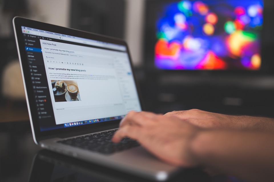 Typing macbook laptop