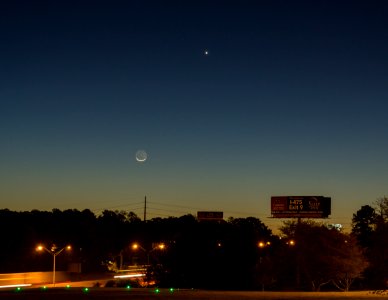 2% Waning Crescent Moon and Venus photo