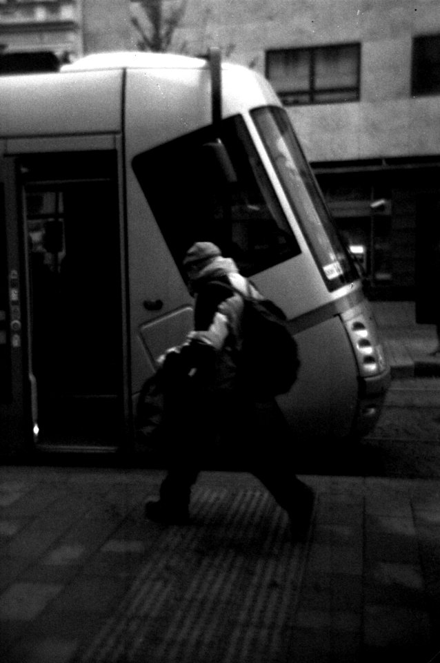 Holga 120FN - Man Running to the Tram photo