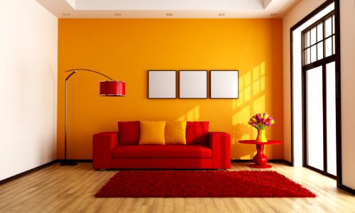 Red and orange living room photo
