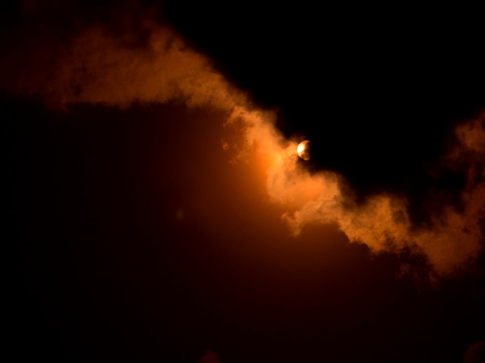 Emerging from the clouds.