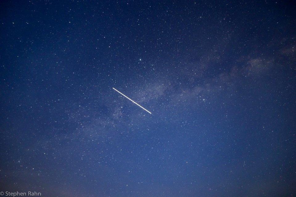 The International Space Station cuts across the Milky Way