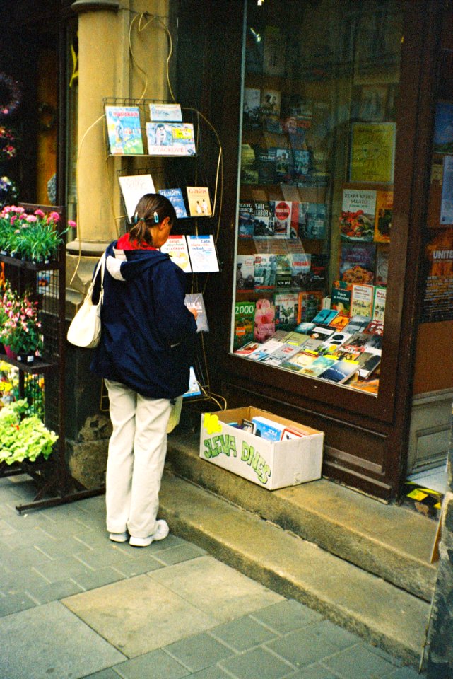 Vilia - Woman in front of Book Store