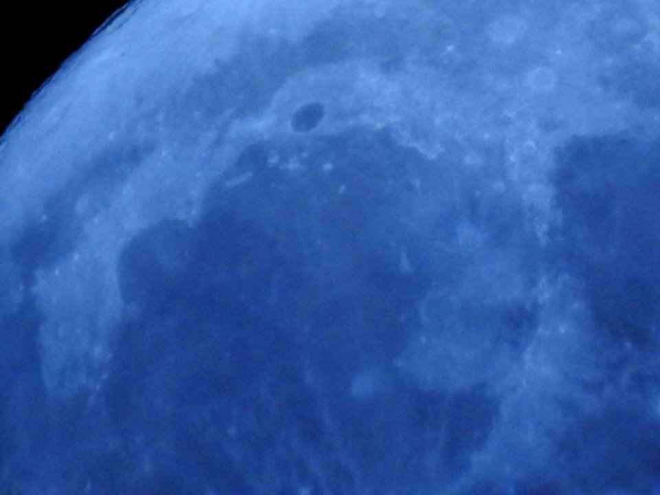 Blue moon, green moon, yellow moon. Tonight's full moon in Fort Collins, Colorado