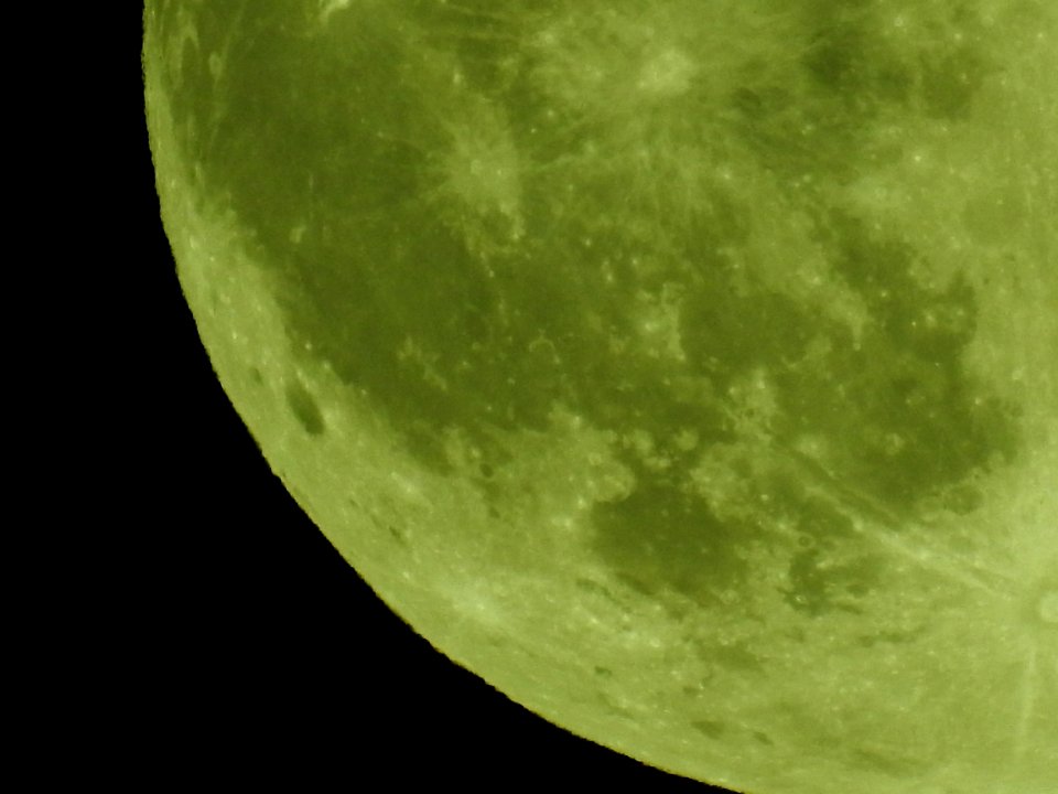 Blue moon, green moon, yellow moon. Tonight's full moon in Fort Collins, Colorado