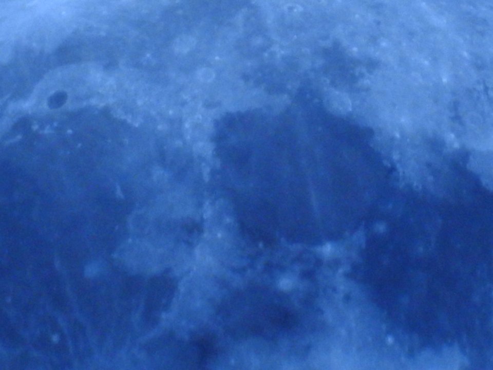 Blue moon, green moon, yellow moon. Tonight's full moon in Fort Collins, Colorado