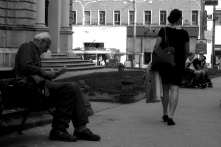 Olympus Mju II - Man Doing a Crossword