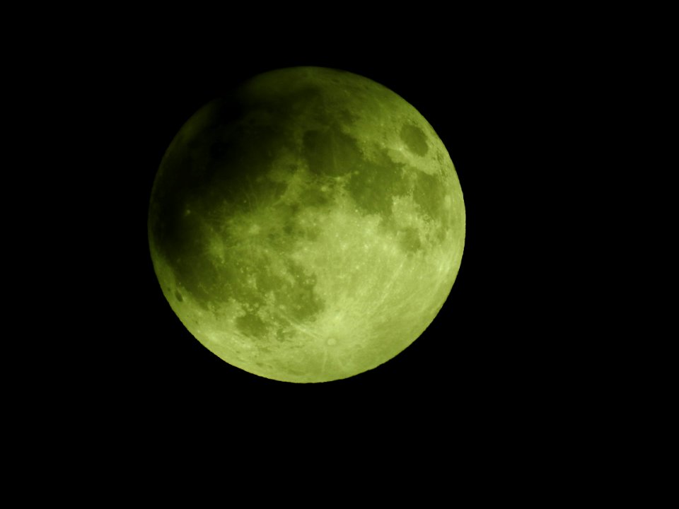 Blue moon, green moon, yellow moon. Tonight's full moon in Fort Collins, Colorado