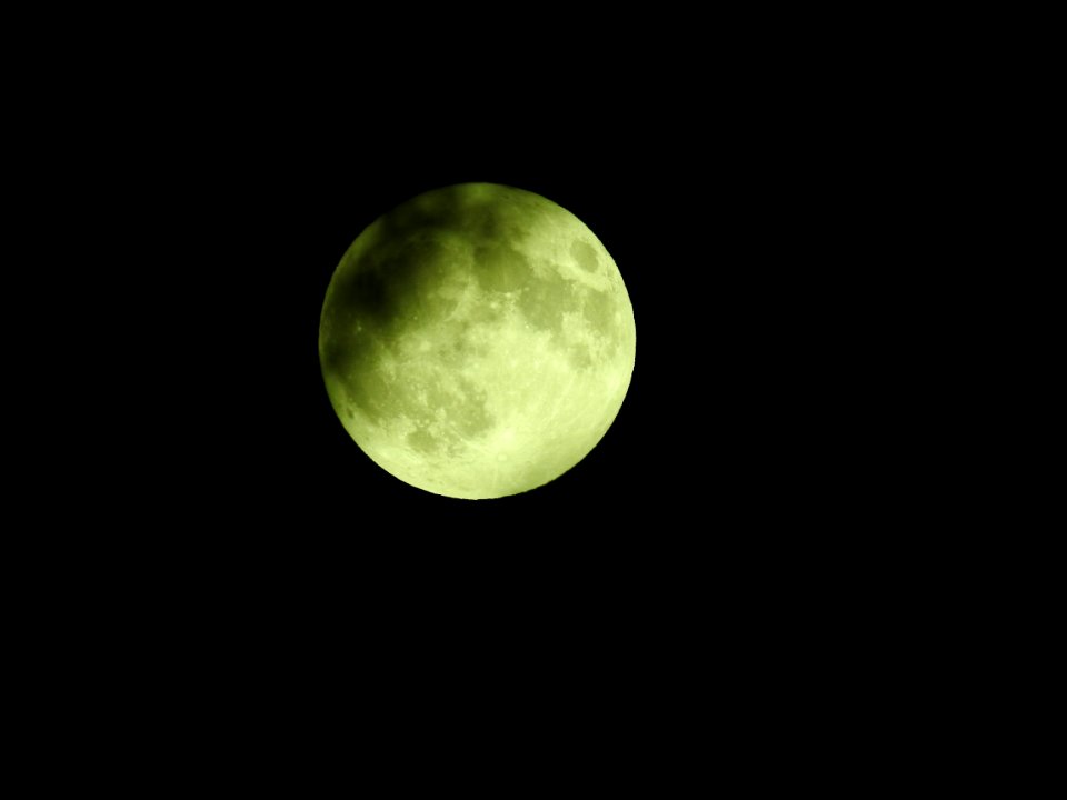 Blue moon, green moon, yellow moon. Tonight's full moon in Fort Collins, Colorado