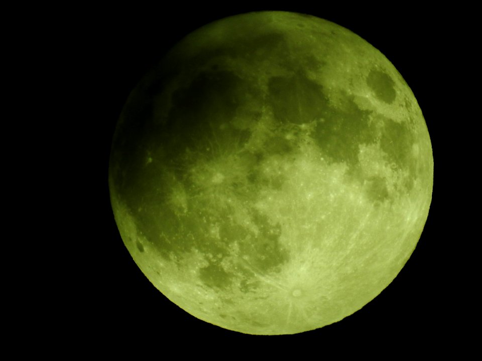 Blue moon, green moon, yellow moon. Tonight's full moon in Fort Collins, Colorado