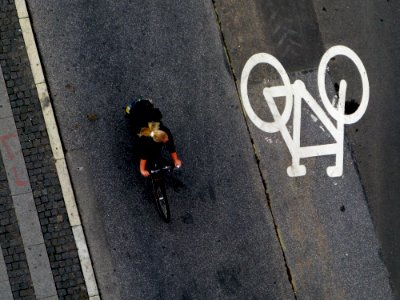 Blonde. Bicycle. Pictogram. photo