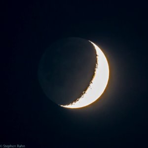 Waxing Crescent Moon with Earth Shine on 7-20-15 photo