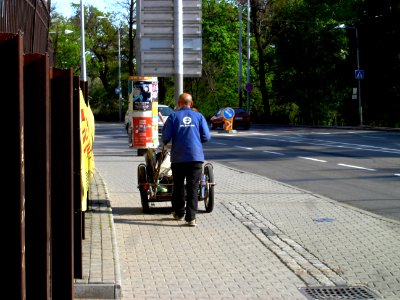 Man Transporting Scrap Iron