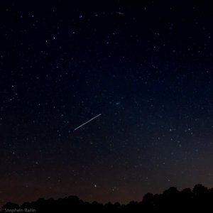 International Space Station and Beehive Cluster with Iridium Flare