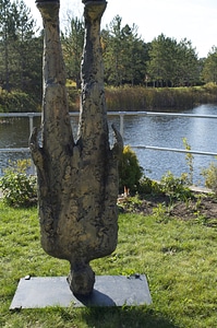 Statue art upside down man photo