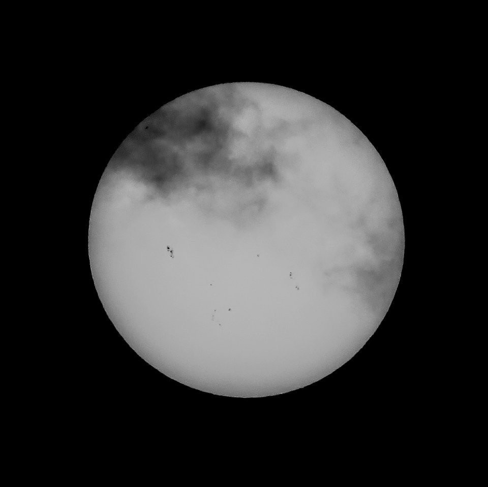 Summer Solstice Sun in Monochrome with Clouds