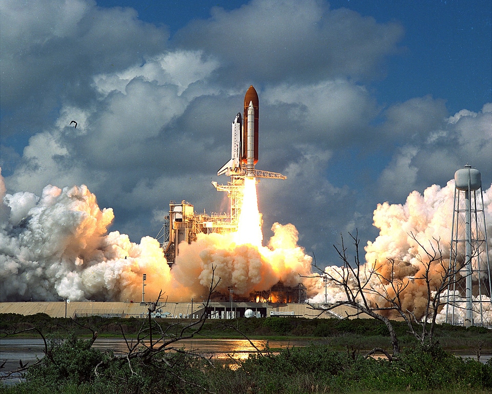 Astronauts liftoff rockets