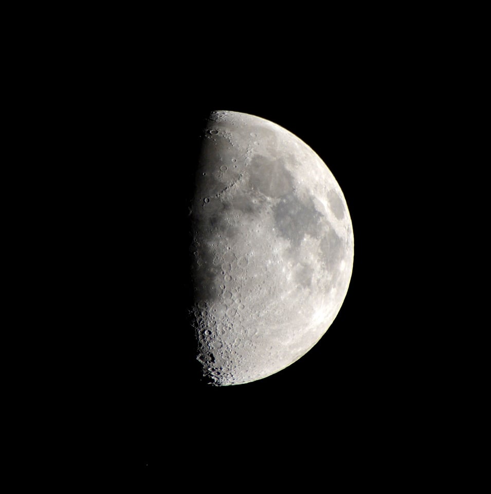 Celestial body half moon lunar surface