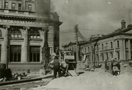 Corner of Lower Rattray Street and Bond Street - concrete mixer and men at work photo