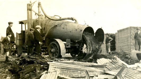 Truck unloading waste in vicinity of Orari Street/Andersons Bay Road c1925