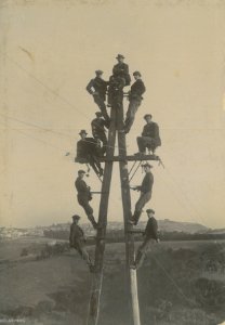 Workers Up a Pole c 1905