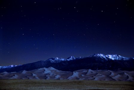 Dunes, Crestone Peaks and Stars on a Quarter Moon Night photo
