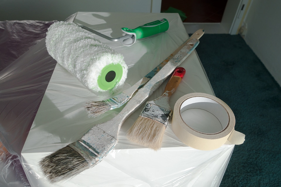 Painters masking renovation painter working