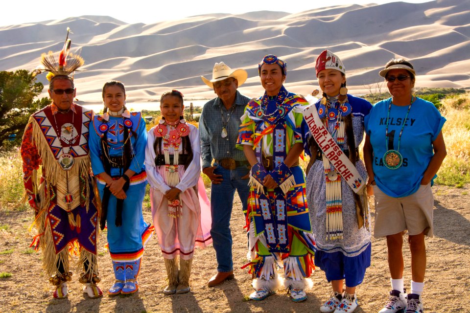 Jicarilla Apache Mundo Dancers, Dunes in Background