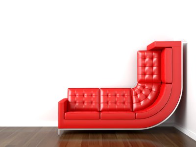 yellow couch bended to climb up wall
