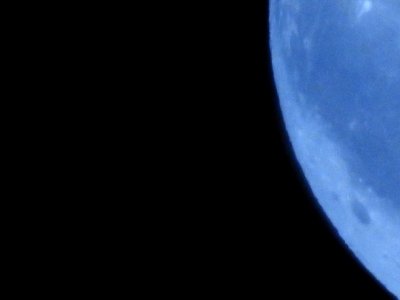 Blue moon, green moon, yellow moon. Tonight's full moon in Fort Collins, Colorado