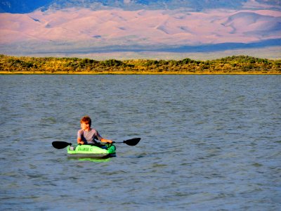 Kayaker, Dunes in Background photo