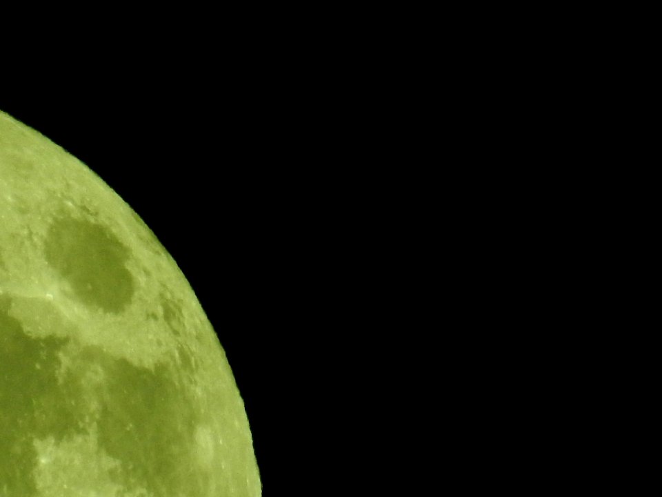 Blue moon, green moon, yellow moon. Tonight's full moon in Fort Collins, Colorado