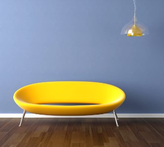 blue wall with yellow couch interior design photo