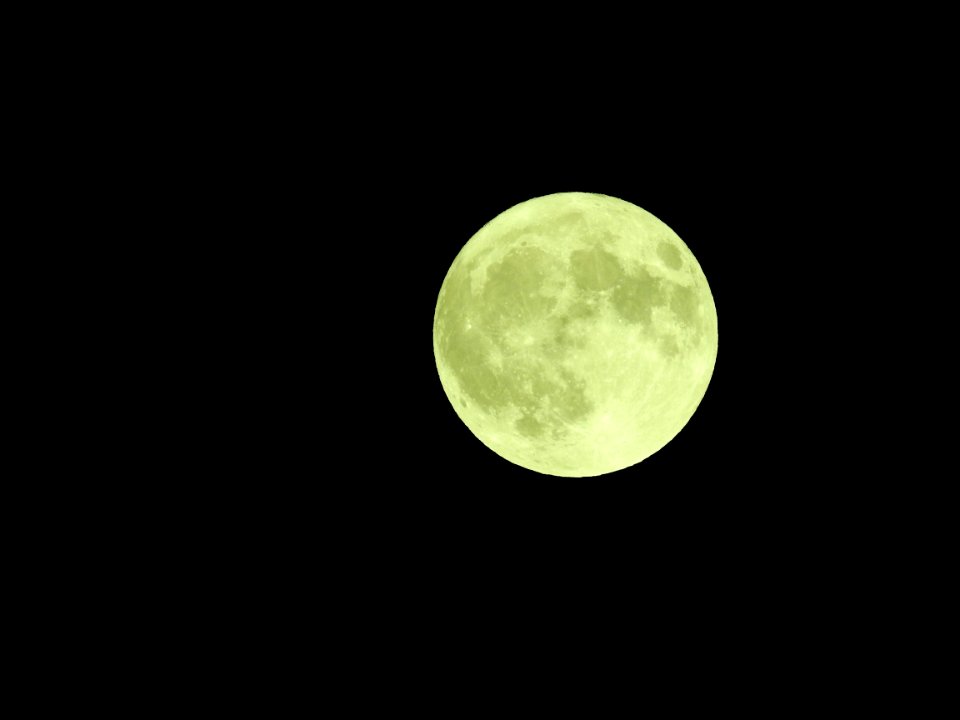 Blue moon, green moon, yellow moon. Tonight's full moon in Fort Collins, Colorado