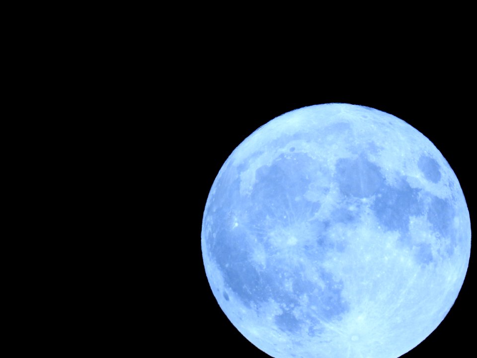 Blue moon, green moon, yellow moon. Tonight's full moon in Fort Collins, Colorado