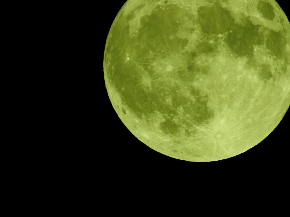 Blue moon, green moon, yellow moon. Tonight's full moon in Fort Collins, Colorado