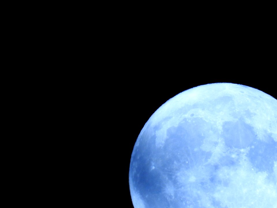 Blue moon, green moon, yellow moon. Tonight's full moon in Fort Collins, Colorado