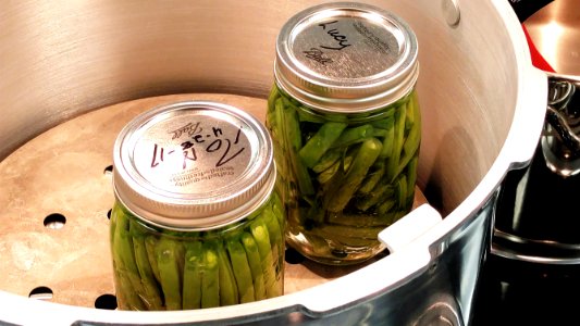 Jars loaded into pressure canner photo