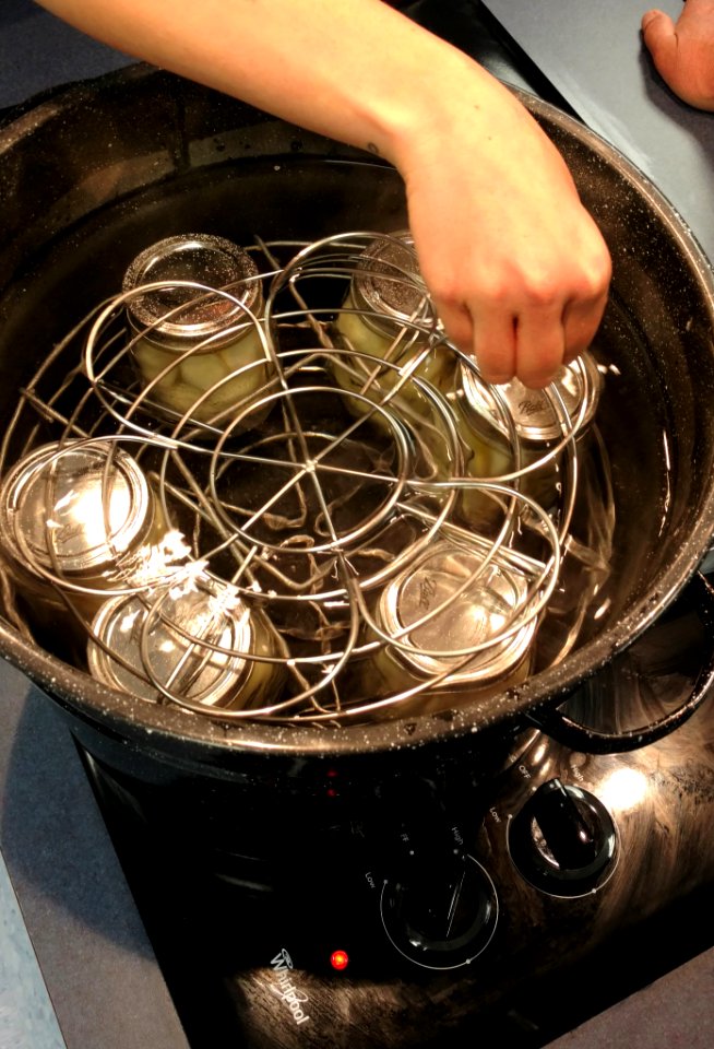 Boiling water bath canner with second rack being added