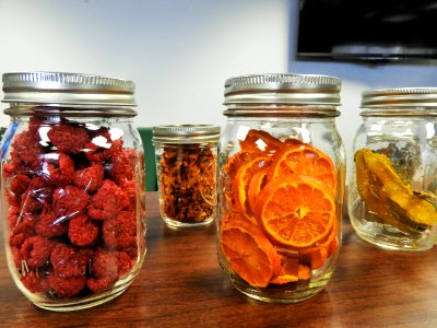 Dried oranges and raspberries photo