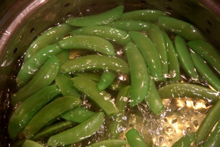 Peas blanching in boiling water